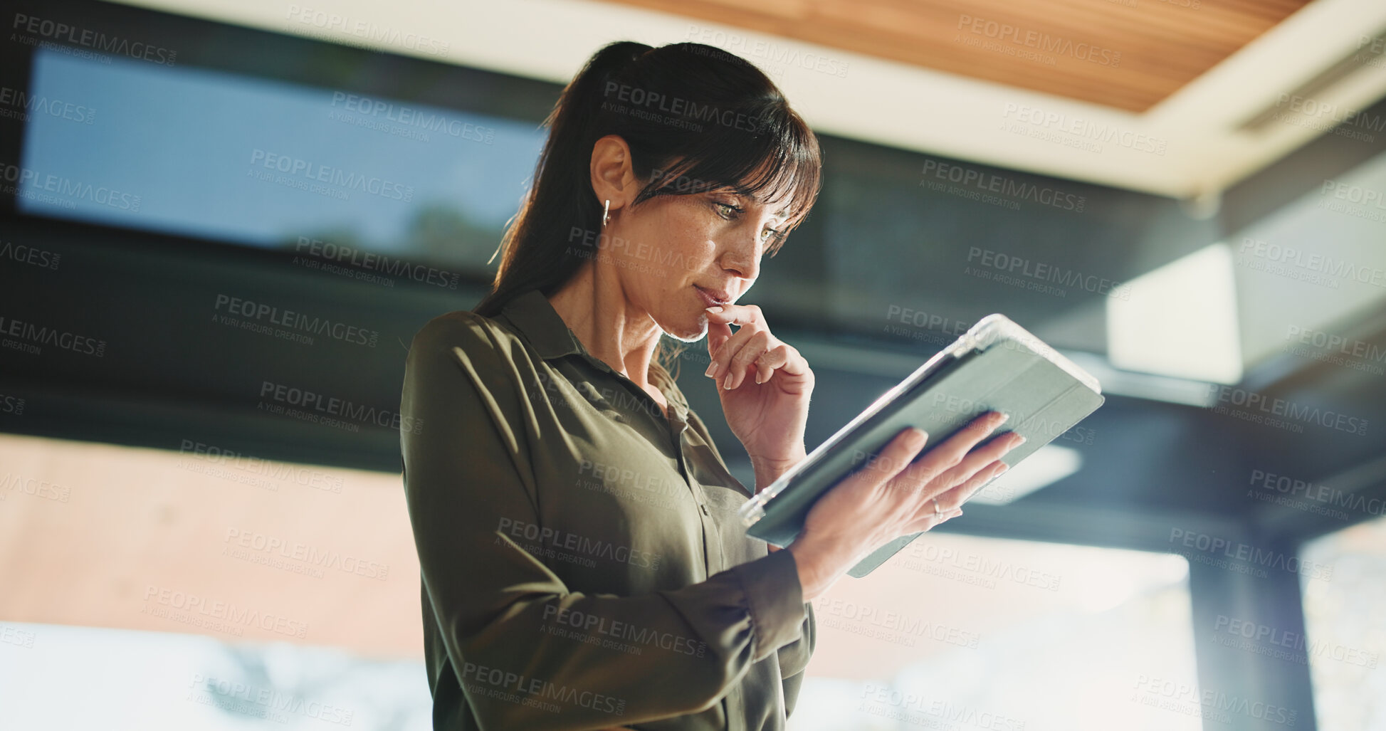 Buy stock photo Thinking, business and woman with tablet, below and news agency with planning for column. Mature person, low angle and journalist in office, tech and problem solving with deadline, ideas and solution