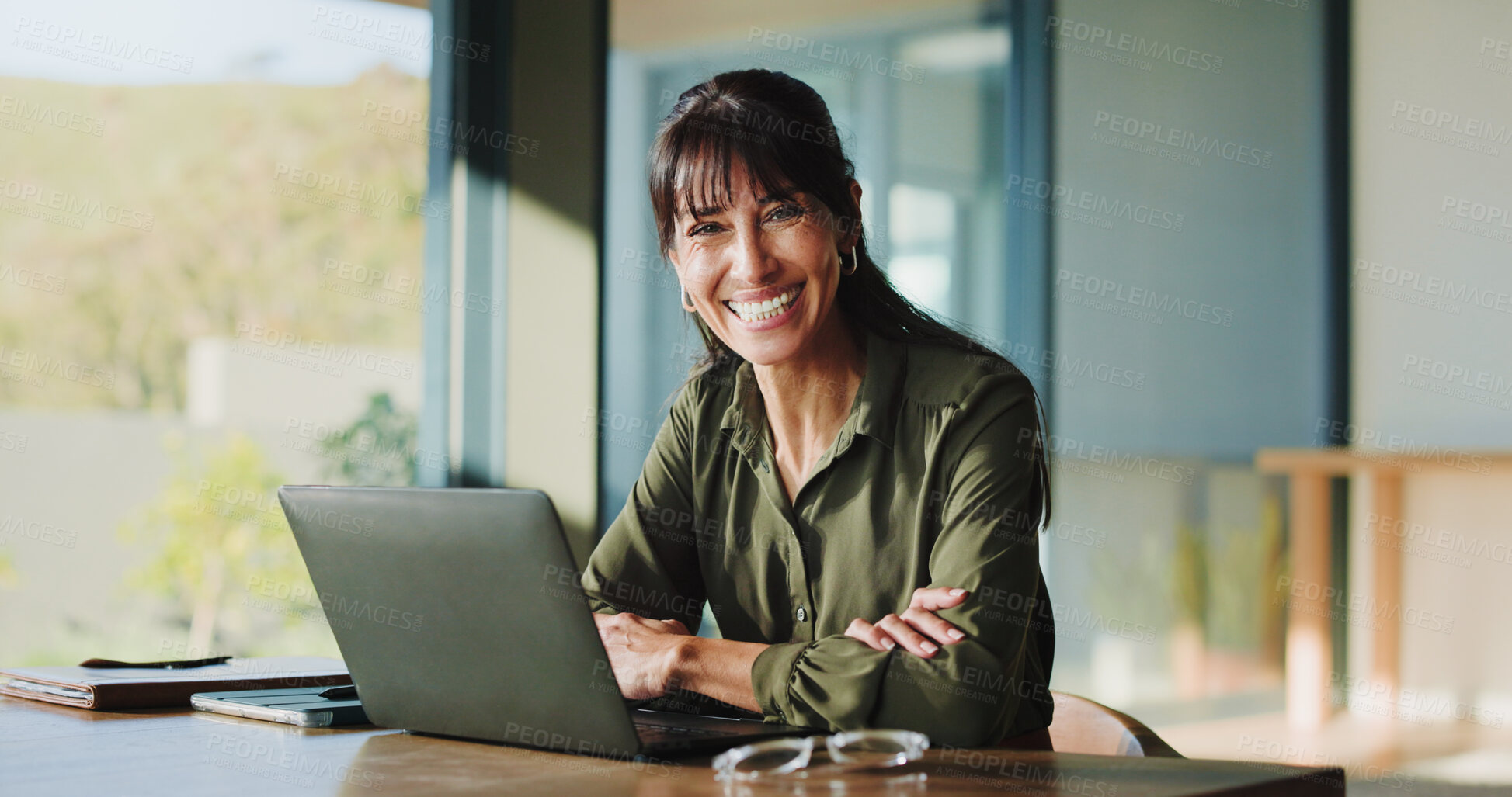 Buy stock photo Portrait, laptop and happy business woman in office as hr manager, talent acquisition and about us. Smile, mature person and confident worker with computer, hiring expert and arms crossed in Canada