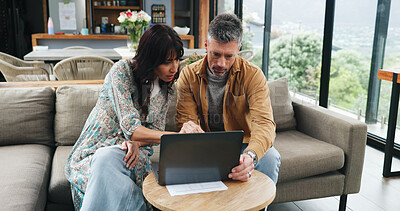 Buy stock photo Couple, reading and sofa with laptop at house for planning, review budget and online payment. Mature people, pc and bank report for household expenses, finance savings and loan application of funding