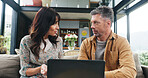 Couple, talk and couch with laptop at house for planning, review budget and online payment. Mature people, discussion and pc for household expenses, financial savings and loan application for funding