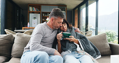 Buy stock photo Coffee, help and husband with sick woman on sofa with blanket for support, love and recovery. Herbal tea, illness and couple in living room for healing and resting with flu, cold or allergies in home