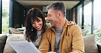 Documents, finance and laughing with couple on sofa in living room of apartment for financial review. Budget, funny and paperwork with happy mature people in home together for investment planning
