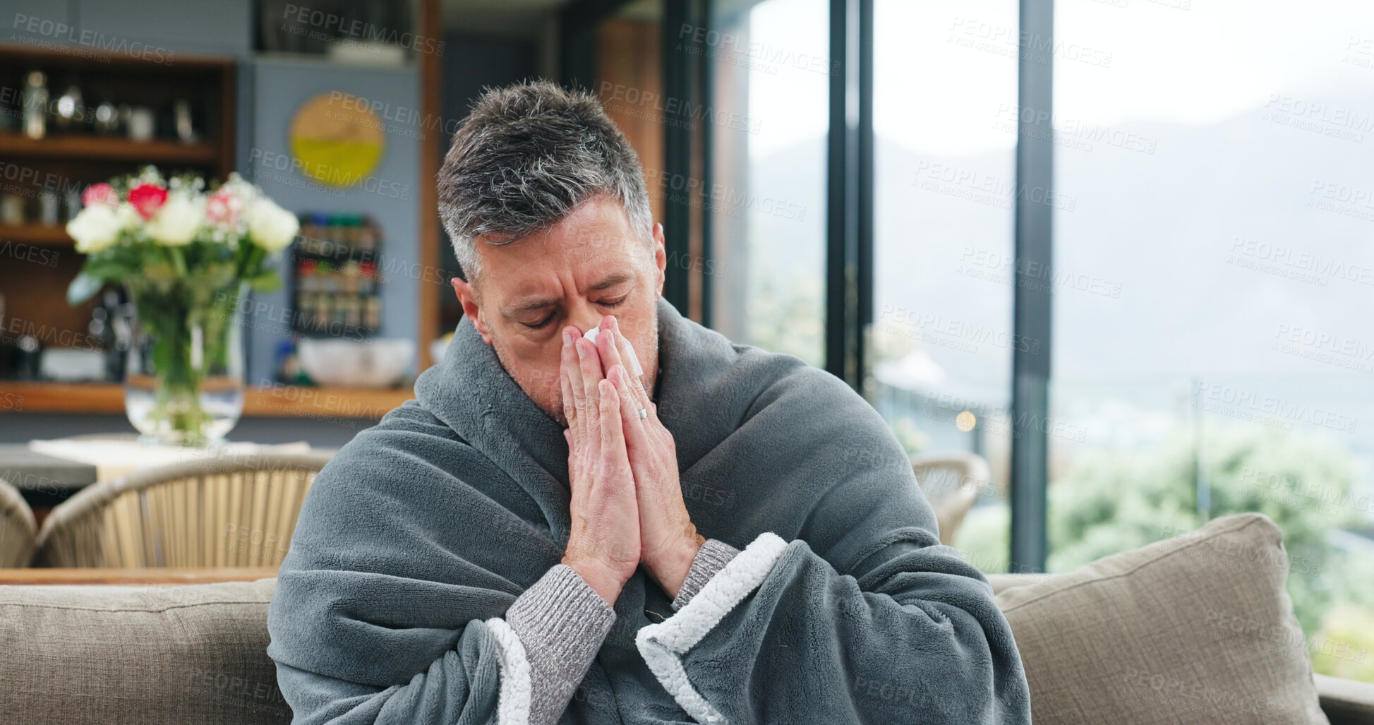 Buy stock photo Blowing nose, sick and cold with man on sofa for virus infection, disease recovery and healthcare. Hayfever symptoms, influenza illness and healing with person and blanket in living room of home