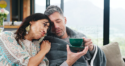 Buy stock photo Sick, tea and hug with couple on sofa of home for disease healing, kindness or support. Influenza recovery, herbal drink and resting with man and woman in living room of apartment for care and trust