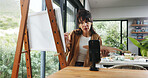 Home, painter and woman with smartphone, influencer and live streaming with fans engagement. Online app, artist or mature person with canvas, cellphone or content creation with tips or showcase craft