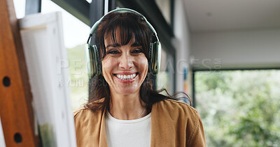 Buy stock photo Painting, headphones and portrait of woman in studio for artwork project, streaming and sketching. Talent, creative drawing and music with person in workshop for gallery art, designer and radio