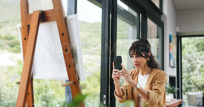 Buy stock photo Painting, phone and picture with woman in workshop for design reference, artist project and contact. Talent inspiration, gallery artwork and canvas with mature person in  studio for photography