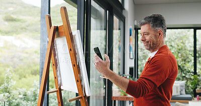 Buy stock photo Art, phone and picture with man in workshop for design reference, artist project and contact. Painting inspiration, gallery artwork and canvas with mature person in studio for photography and painter
