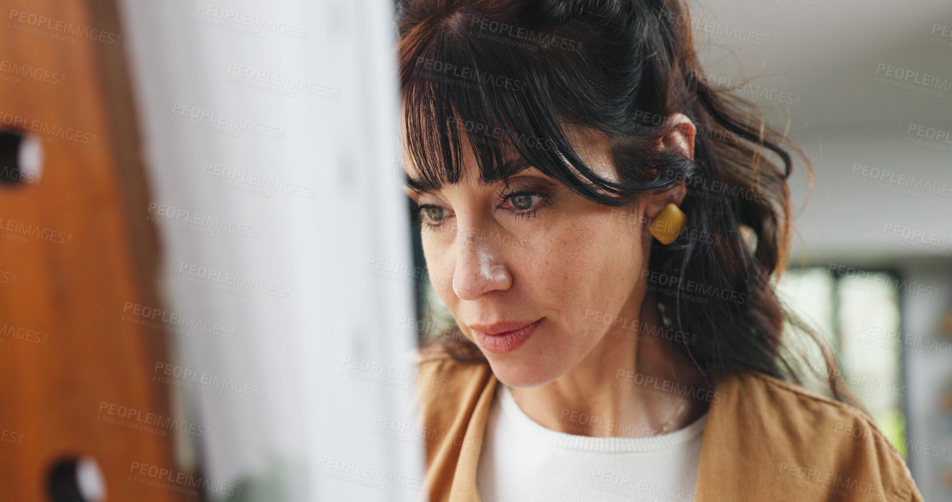 Buy stock photo Painting, woman or canvas in home for creativity project, self expression or concentration in craft. Calm, freelancer or mature artist with easel for artistic activity, passion or talent for creation