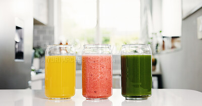 Buy stock photo Organic, juice or glasses in kitchen with healthy diet for antioxidant, vitamin or mineral benefits. Natural detox, beverage or drinks selection in home for digestive health, nutrition and hydration.