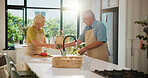 Senior couple, rinse vegetables and kitchen with cleaning, recipe and helping hand for dinner at house. People, wash pepper and ingredients with cooking, diet and hygiene for nutrition in retirement