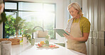 Senior woman, tablet and cooking in kitchen with search, recipe and online course for dinner at house. Person, vegetables and ingredients with tech, app and tutorial video for nutrition in retirement