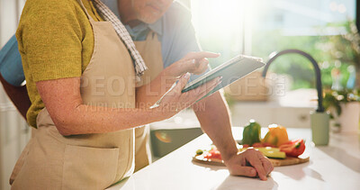 Buy stock photo Couple, hands or app with tablet in kitchen for online cooking tutorial or healthy recipe. Apron, man or woman scrolling with technology or ingredients for natural organic food or meal prep in home