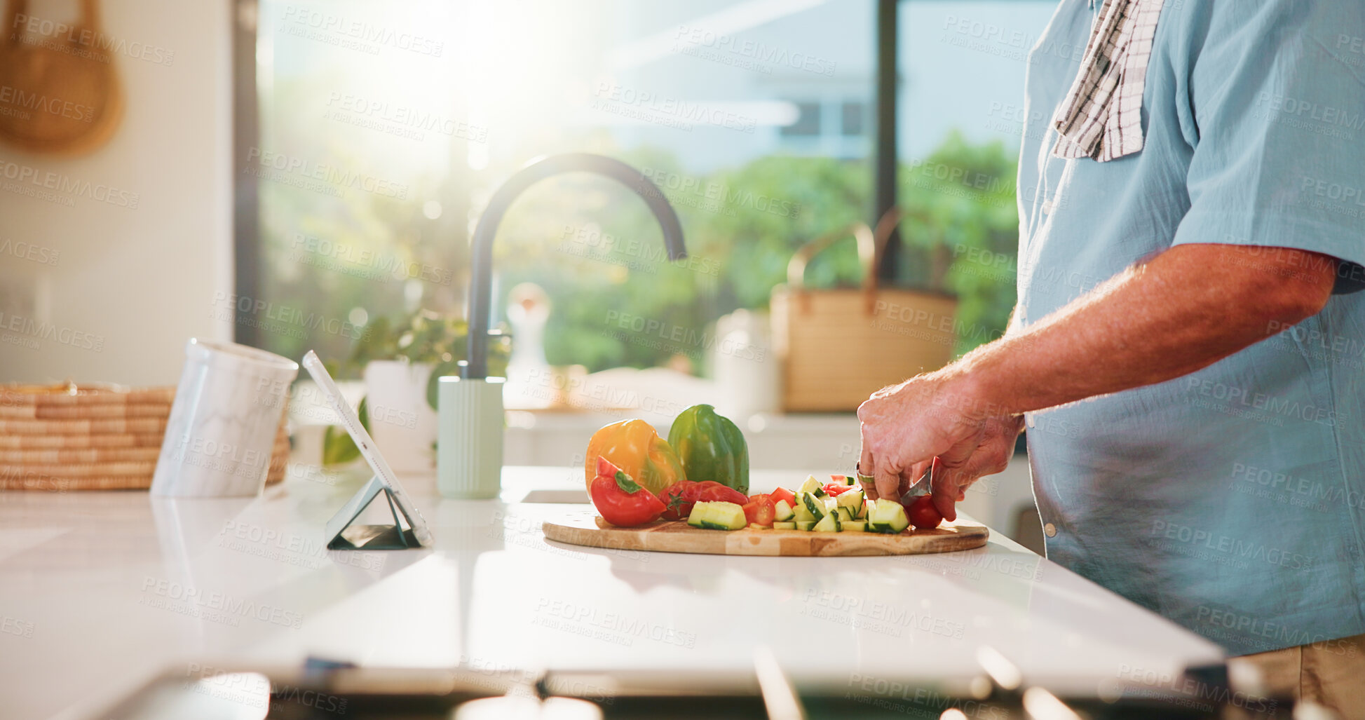 Buy stock photo Man, hands and vegetables with tablet, food or meal prep for healthy cooking tutorial in kitchen. Male person, chopping or preparation with technology, flare or ingredients for organic recipe or diet