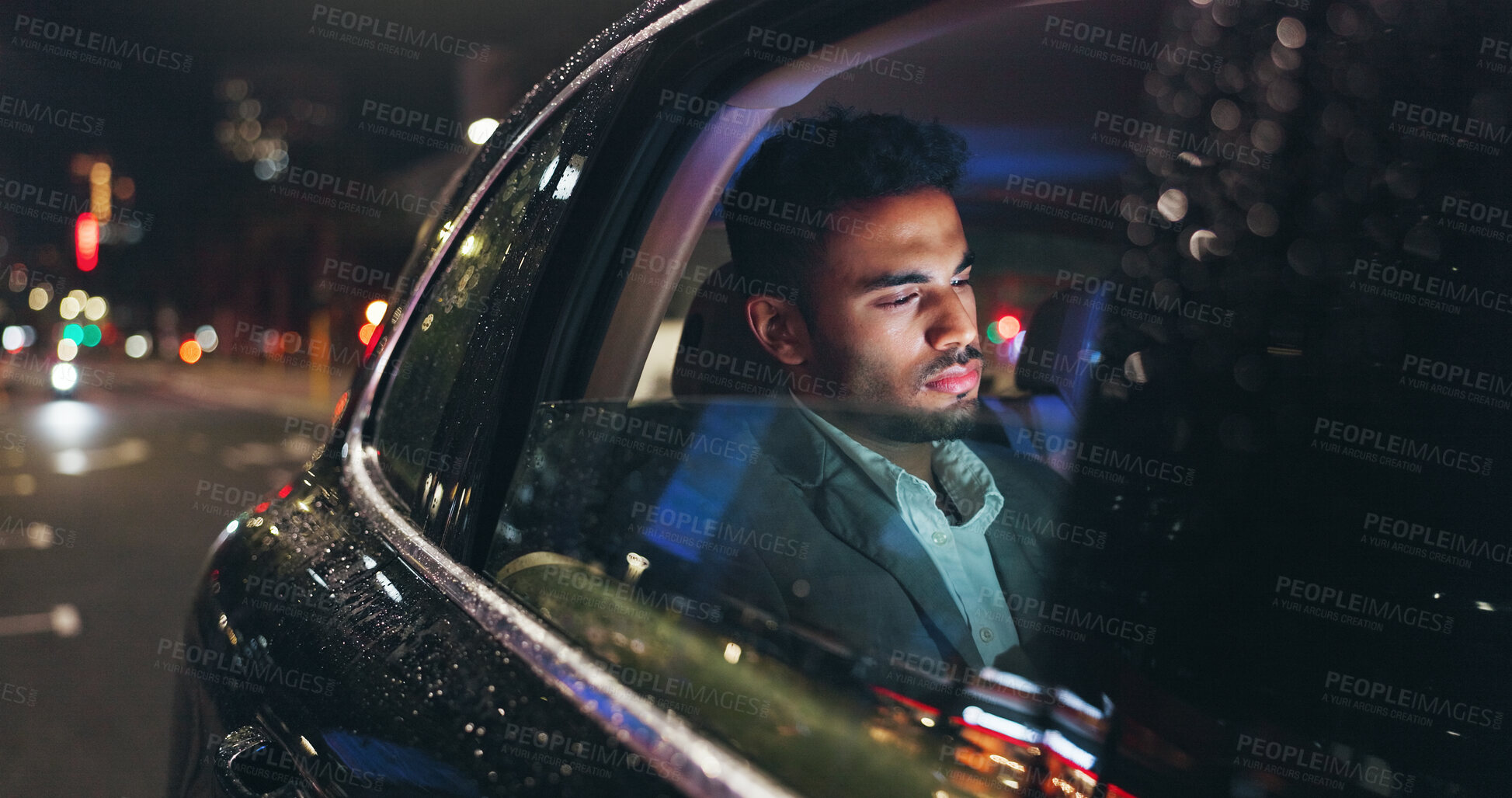 Buy stock photo Serious, travel and businessman in car at night in city with technology for networking with email. Reading, research and male person checking project with deadline in vehicle with commute in town.