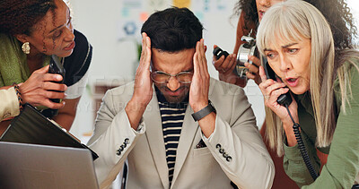 Buy stock photo Man, headache and chaos with team, laptop and review for time management with deadline at media company. Person, computer and crisis with stress, phone or overwhelmed with group at creative agency