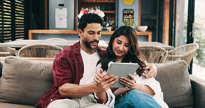 Buy stock photo Tablet, relax and couple on sofa in home for planning romantic holiday together online. Happy, digital technology and man with woman for booking flight tickets in living room for vacation in house.