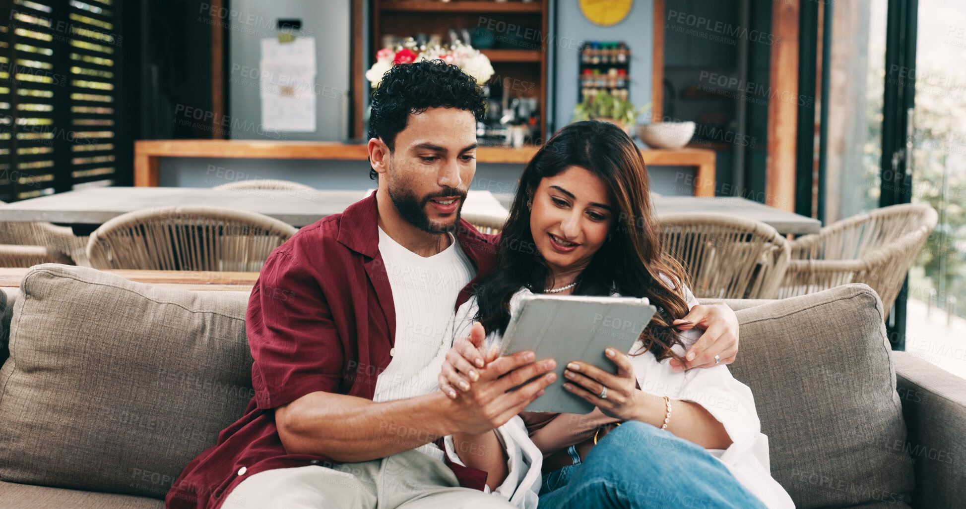 Buy stock photo Tablet, relax and couple on sofa in home for planning romantic holiday together online. Happy, digital technology and man with woman for booking flight tickets in living room for vacation in house.