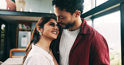 Buy stock photo Home, smile and couple with connection for love, care or marriage commitment for loyalty. Romance, happy man and woman in living room together for healthy relationship, support or trust with partner