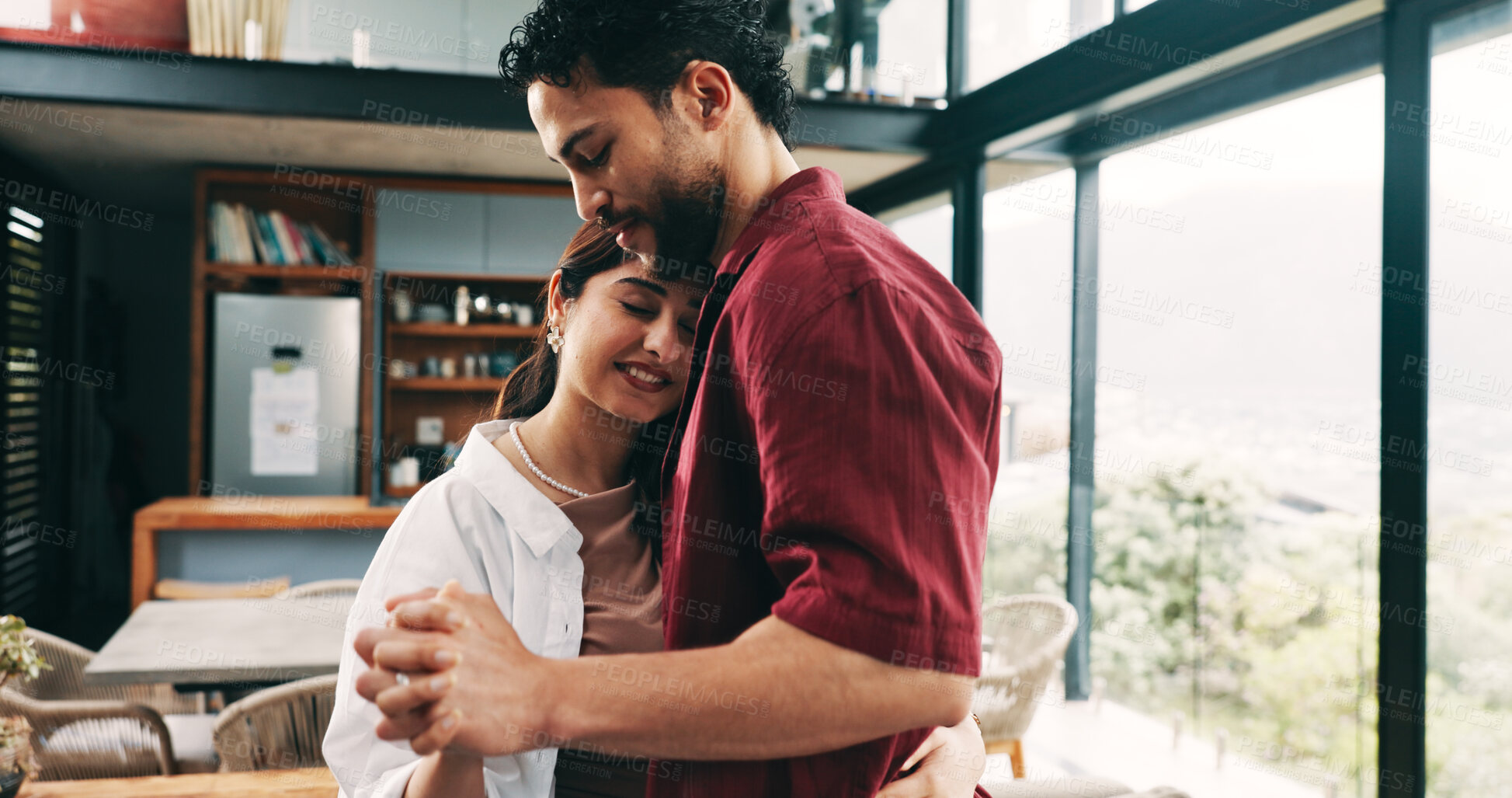 Buy stock photo Smile, love and couple dance in home with care, valentines day and marriage commitment to partner. Happy man, woman and holding hands with music for loyalty, support and hug for healthy relationship