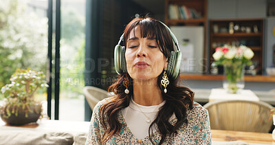 Buy stock photo Calm, headphones and woman on sofa in home for relax, zen or peace in living room in morning. Breathing, audio tech and female person listening to guided meditation for spiritual wellness or health.