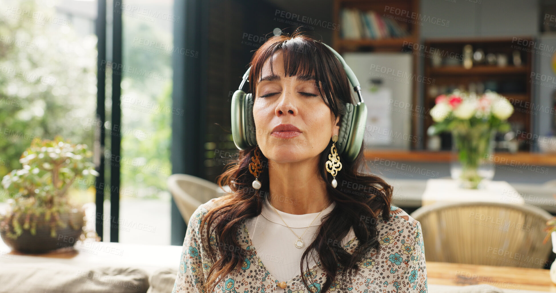 Buy stock photo Calm, headphones and woman on sofa in home for relax, zen or peace in living room in morning. Breathing, audio tech and female person listening to guided meditation for spiritual wellness or health.