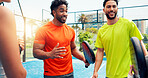Padel, team and happy with talking on court for sports break, tournament practice or game advice. Men, tennis friends or conversation at fitness club with match planning, friendly discussion or flare