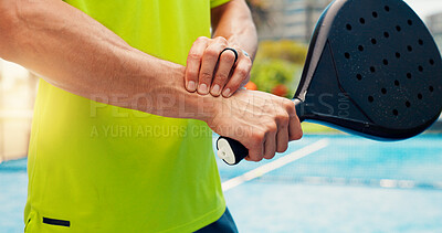 Buy stock photo Man, hands and wrist pain with padel for sport injury, muscle tension or accident for match or game. Closeup, male person or sore arm with bat for discomfort, overworked or emergency on outdoor court