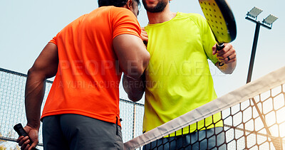 Buy stock photo Men, athletes and handshake for padel, court and respect for opponent, sportsmanship or competition. Outdoor, tennis players and hug for friendly match, greeting and people with racket and low angle