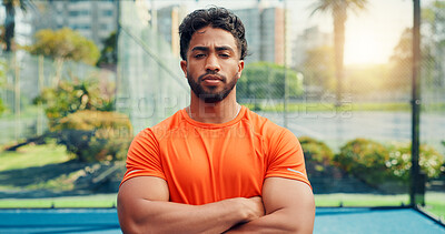 Buy stock photo Padel, man and serious with arms crossed on court for match practice, fitness or ready for training. Sport athlete, tennis player or portrait at health club for competition, wellness and game workout