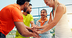 Padel, stack of hands and friends on court for fitness, workout or training together for match. Happy, people and group of athletes with teamwork for exercise, sports or practice for game outdoor.