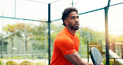 Buy stock photo Padel, training and fitness with man on court for sports athlete, contest and tournament club. Serious, competition and tennis player or person on outdoor turf for exercise, game and match challenge