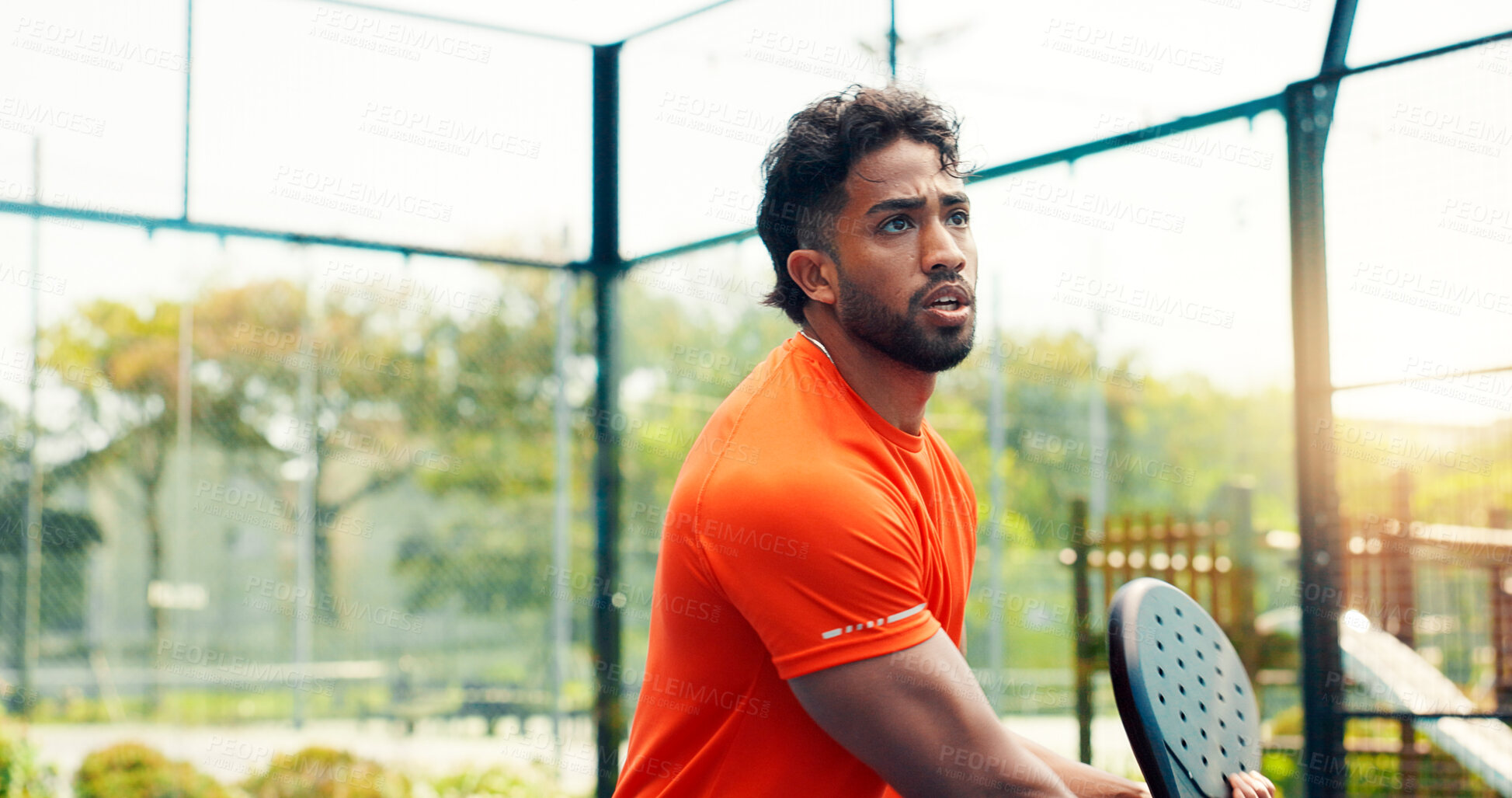 Buy stock photo Padel, training and fitness with man on court for sports athlete, contest and tournament club. Serious, competition and tennis player or person on outdoor turf for exercise, game and match challenge