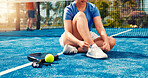 Woman, hands and tie shoes on padel court for outdoor match or workout preparation. Wellness, female person and legs getting ready with sneakers, laces and sport for game, fitness or challenge