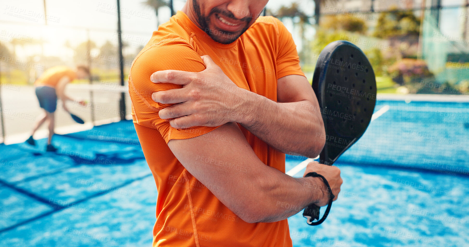 Buy stock photo Athlete, person and shoulder pain on padel court from fitness, match accident and muscle sprain. Man, discomfort and joint strain with tennis mistake, inflammation and sports injury from tournament