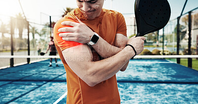 Buy stock photo Man, discomfort and shoulder pain on padel court from fitness, match accident and muscle sprain. Person, red glow and joint strain with exercise mistake, inflammation and tennis injury from fracture 