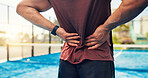 Hands, person and back pain on padel court from fitness, match accident and muscle sprain. Player, discomfort and joint strain of exercise mistake, inflammation and sports injury from tournament game