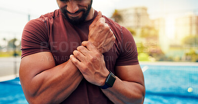 Buy stock photo Wrist pain, hands or man on tennis court with sports injury, outdoor workout or strain for inflammation. Padel accident, poor technique or athlete with tendinitis from game, muscle tension or sprain