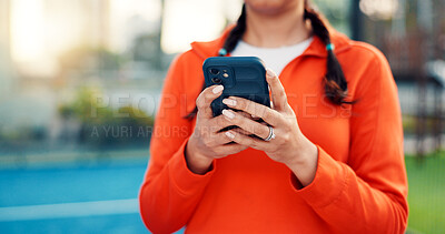 Buy stock photo Hands, woman and reading with phone on tennis court with fitness app, training tips and track progress. Person, mobile and booking for padel, technique and video demonstration for tournament schedule