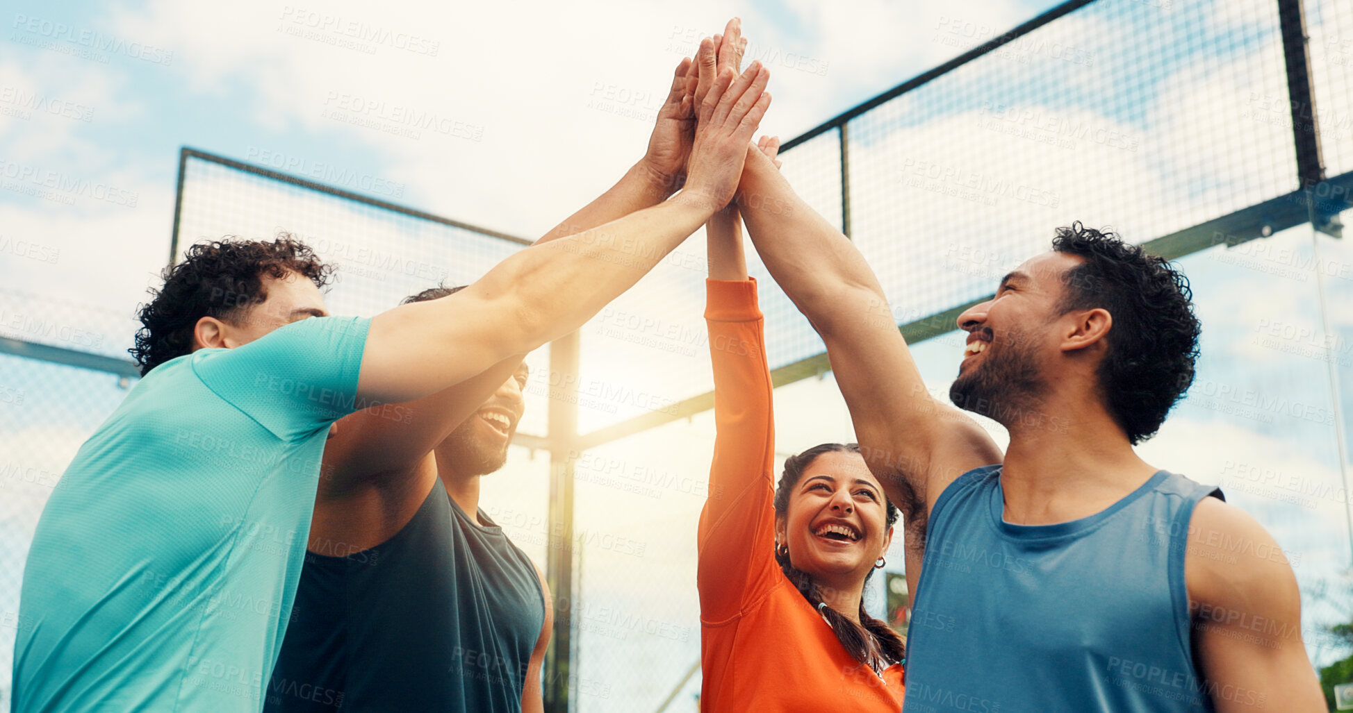 Buy stock photo People, team and high five for padel, sports and excited for celebration, success or low angle for game. Men, woman and happy for support, training or achievement with contest on tennis court at club