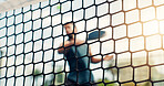 Net, padel and man with training, match and serve with competition, contest and fitness. Tennis player, outdoor and healthy person with wellness, technique and sports game with workout and facility
