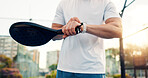 Hands, smart watch and padel with fitness, click and check stats for training, results or heart rate. Person, athlete and iot wristwatch for sport, racket and monitor in city at tennis court for game