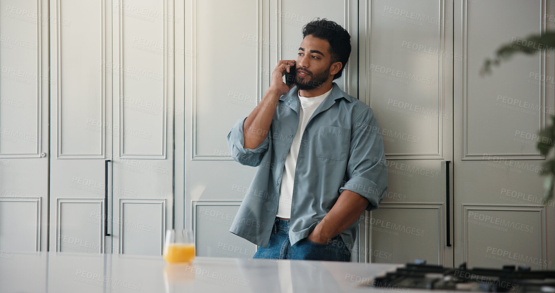 Buy stock photo Man, student and relax with phone call at house for discussion, study schedule and feedback. Male person, mobile and juice to contact college for enrolment, education consultation and admission chat