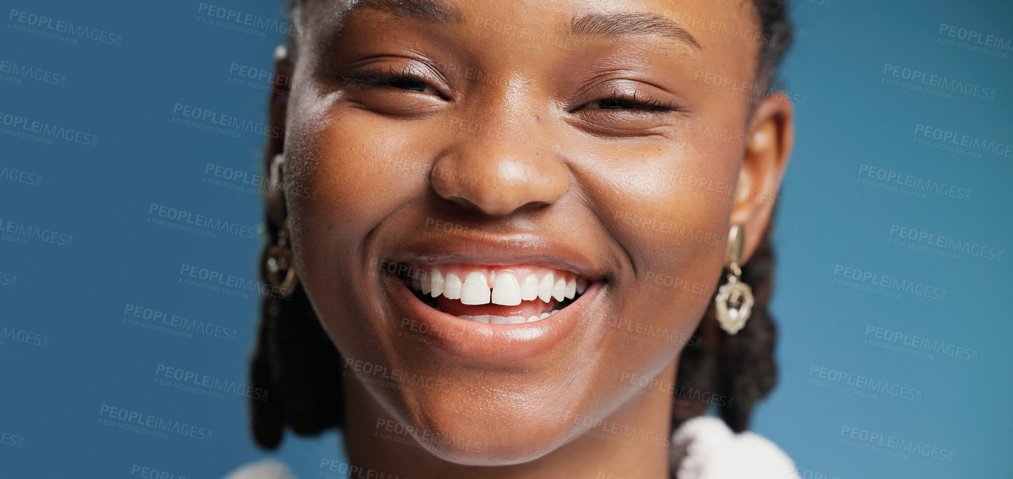Buy stock photo Portrait, black woman and smile for dental in studio for teeth whitening, oral care and hygiene. Banner, female person and confident for fresh breath, happiness and veneers results on blue background
