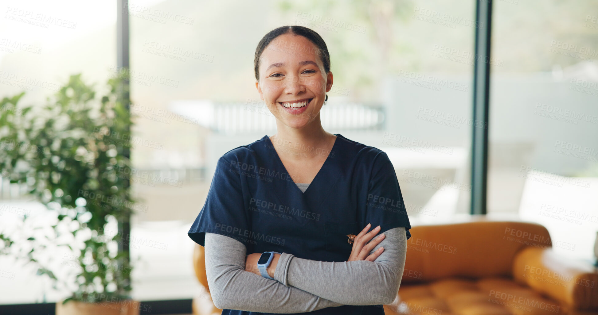 Buy stock photo Arms crossed, portrait and smile of nurse woman in home for healthcare or medical assistance. About us, medicare and wellness with happy caregiver in apartment for assisted living or homecare support