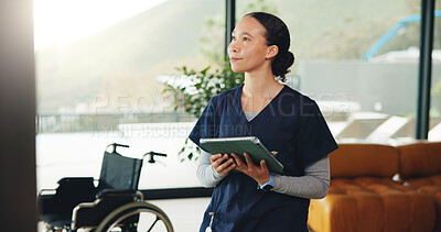 Buy stock photo Planning, tablet and thinking with nurse woman in home for healthcare or medical assistance. App, vision and wheelchair with caregiver in apartment for assisted living, homecare or medicare support