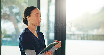 Buy stock photo Healthcare, tablet and thinking with nurse woman in home for hope or medical assistance. App, medicare and wish with thoughtful caregiver in apartment for assisted living or homecare dream and vision