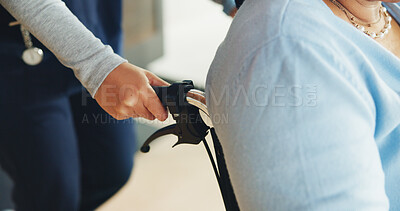 Buy stock photo Support, nurse and hands in clinic with wheelchair, assistance or trust in disability care. Healthcare, rehabilitation or caregiver in hospital with mobility aid, help and empathy for retired patient