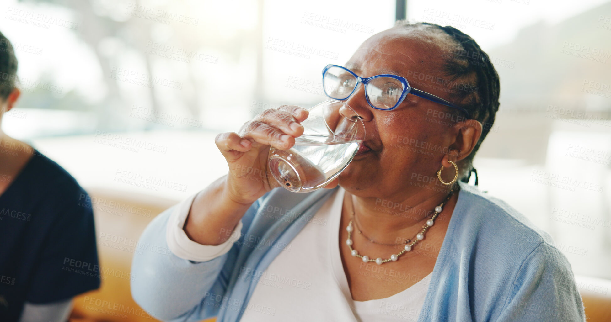 Buy stock photo Senior woman, water and drinking with nurse for hydration, medication or healthcare in nursing home. Elderly, female person or thirst with mineral liquid, aqua or beverage for assisted living or help