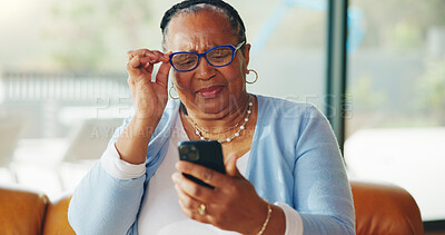 Buy stock photo Old woman, glasses and struggle with mobile reading, vision problem and small font size for difficulty. Upset, retirement or elderly person with poor eyesight to view phone, blurry text or aging eyes